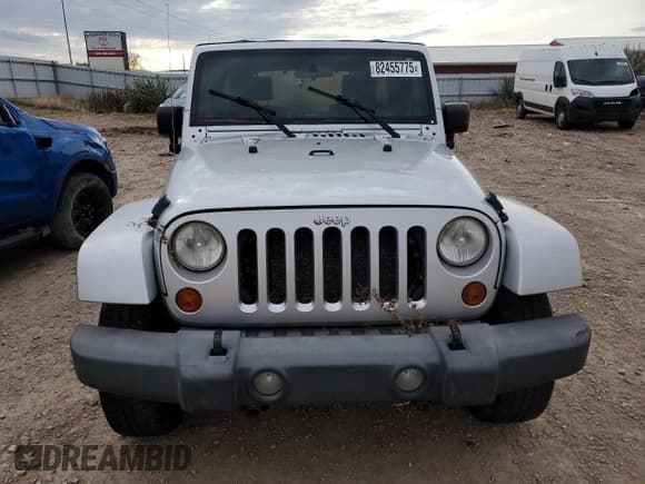 ✅ 2007 Jeep Wrangler Unlimited Sahara • VIN: 1J4GA59167L212909 • Lot: 82455775. Listed on Copart with 124,148 mi. Free auction sales archive from the USA and detailed vehicle history report at DreamBid. Image 5.