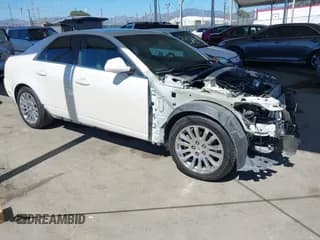 ✅ 2012 Cadillac CTS Premium • VIN: 1G6DP5E33C0134831 • Lot: 42638869. Listed on IAAI with 89,948 mi. Free auction sales archive from the USA and detailed vehicle history report at DreamBid. Image 1.