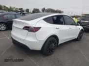 ✅ 2022 Tesla Model Y Performance • VIN: 7SAYGDEFXNF484838 • Lot: 42790927. Listed on IAAI with 8,729 mi. Free auction sales archive from the USA and detailed vehicle history report at DreamBid. Image 4.