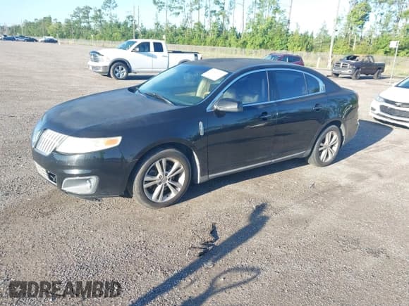 ✅ 2009 Lincoln MKS • VIN: 1LNHM93R39G603949 • Лот: 42829339. Опубликован ранее на IAAI с пробегом 166 090 миль. Бесплатный доступ к архиву аукционных продаж из США и подробный отчёт об истории автомобиля на DreamBid. Изображение 2.