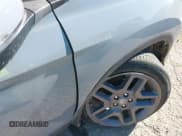 ✅ 2022 Honda Passport EX-L • VIN: 5FNYF7H57NB005716 • Lot: 41078499. Listed on IAAI with 33,141 mi. Free auction sales archive from the USA and detailed vehicle history report at DreamBid. Image 6.