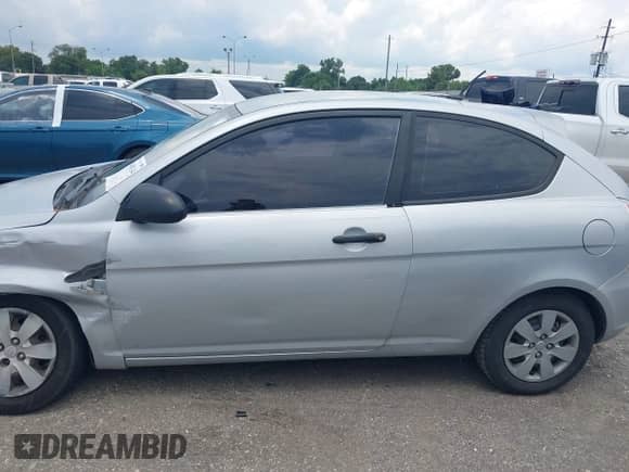 2008 Hyundai Accent GS with VIN KMHCM36C68U079842, listed as a IAAI auction lot 43082144 with 192,937 mi miles and . Bid and sale history available at DreamBid. Image 14.