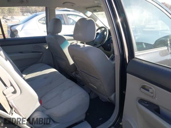 ✅ 2007 Kia Rondo LX • VIN: KNAFG525677122033 • Lot: 43701064. Listed on IAAI with 205,352 mi. Free auction sales archive from the USA and detailed vehicle history report at DreamBid. Image 8.