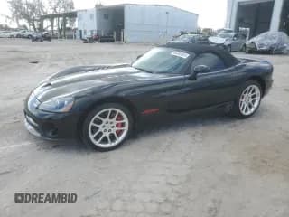 ✅ 2006 Dodge Viper SRT-10 • VIN: 1B3JZ65Z26V100103 • Lot: 84389324. Listed on Copart with 30,116 mi. Free auction sales archive from the USA and detailed vehicle history report at DreamBid. Image 1.