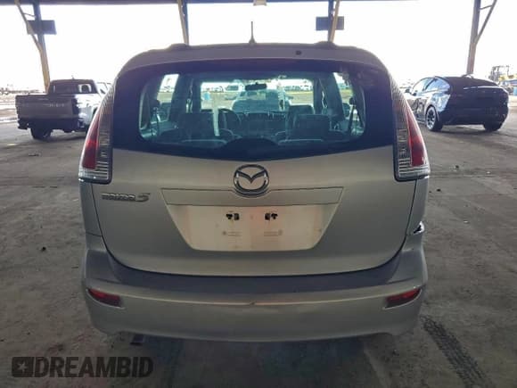 ✅ 2009 Mazda 5 Sport • VIN: JM1CR293590358705 • Lot: 93954035. Wystawiony na Copart z przebiegiem 150 289 mil. Bezpłatny archiwum sprzedaży aukcyjnych z USA i szczegółowy raport historii pojazdu na DreamBid. Zdjęcie 6.