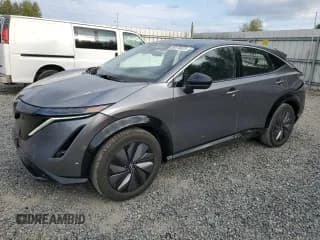✅ 2023 Nissan ARIYA Evolve+ • VIN: JN1BF0BA3PM411301 • Lot: 80173675. Listed on Copart with 25,960 mi. Free auction sales archive from the USA and detailed vehicle history report at DreamBid. Image 1.