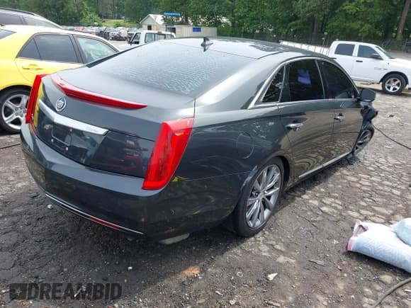 ✅ 2013 Cadillac XTS • VIN: 2G61N5S37D9145545 • Лот: 42290307. Опубликован ранее на IAAI с пробегом 147 439 миль. Бесплатный доступ к архиву аукционных продаж из США и подробный отчёт об истории автомобиля на DreamBid. Изображение 4.