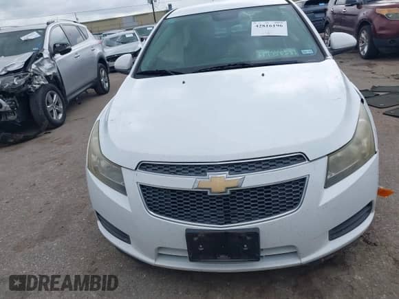 2012 Chevrolet Cruze 1FL z VIN 1G1PE5SC8C7357659, wystawiony jako IAAI lot #42816196 z przebiegiem 100 229 mil mil oraz . Historia ofert i sprzedaży dostępna na DreamBid. Obrazek 12.