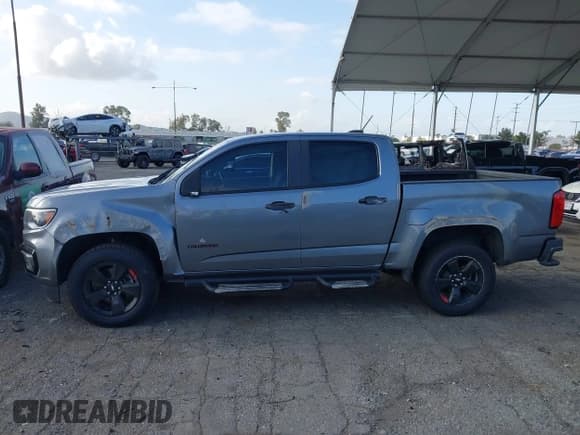 ✅ 2021 Chevrolet Colorado 2WD LT • VIN: 1GCGSCEA8M1131558 • Лот: 41950001. Опубликован ранее на IAAI с пробегом 77 090 миль. Бесплатный доступ к архиву аукционных продаж из США и подробный отчёт об истории автомобиля на DreamBid. Изображение 14.