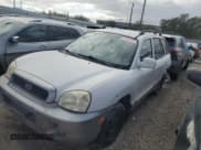 ✅ 2002 Hyundai Santa Fe GLS • VIN: KM8SC73D92U175975 • Лот: 71291915. Опубликован ранее на Copart с пробегом 124 648 миль. Бесплатный доступ к архиву аукционных продаж из США и подробный отчёт об истории автомобиля на DreamBid. Изображение 1.