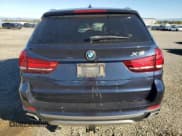 ✅ 2018 BMW X5 xDrive35i • VIN: 5UXKR0C54J0Y05036 • Лот: 90570735. Опубликован ранее на Copart с пробегом 97 897 миль. Бесплатный доступ к архиву аукционных продаж из США и подробный отчёт об истории автомобиля на DreamBid. Изображение 6.