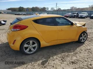 ✅ 2013 Hyundai Veloster w/Black Int • VIN: KMHTC6AD3DU107417 • Lot: 82538624. Wystawiony na Copart z przebiegiem 168 829 mil. Bezpłatny archiwum sprzedaży aukcyjnych z USA i szczegółowy raport historii pojazdu na DreamBid. Zdjęcie 3.