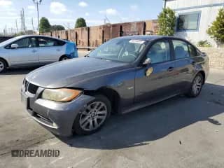 2006 BMW 3 Series 325i with VIN WBAVB13576KX49823, listed as a Copart auction lot 86594605 with 309,025 mi miles and Salvage title. Bid and sale history available at DreamBid. Image 1.