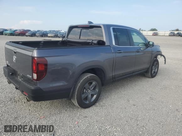 ✅ 2023 Honda Ridgeline RTL • VIN: 5FPYK3F52PB067624 • Lot: 68660025. Listed on Copart with 13,508 mi. Free auction sales archive from the USA and detailed vehicle history report at DreamBid. Image 3.