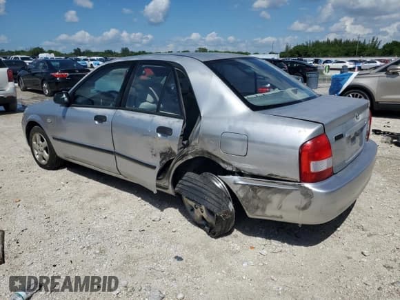 ✅ 2002 Mazda Protege DX • VIN: JM1BJ225320634626 • Lot: 84905245. Wystawiony na Copart z przebiegiem 178 114 mil. Bezpłatny archiwum sprzedaży aukcyjnych z USA i szczegółowy raport historii pojazdu na DreamBid. Zdjęcie 2.