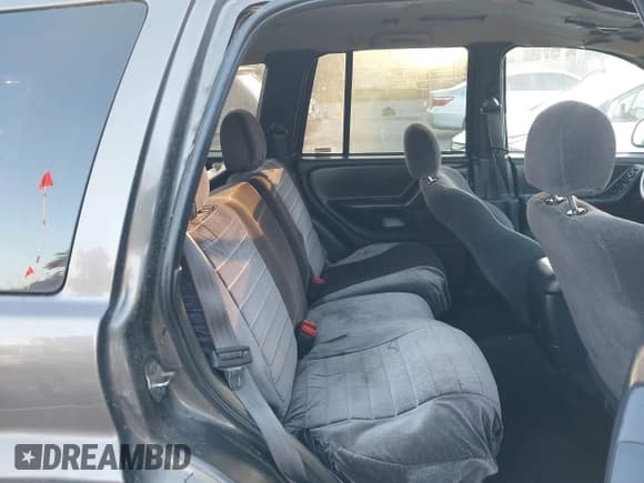 ✅ 1999 Jeep Grand Cherokee Laredo • VIN: 1J4G258S3XC560920 • Lot: 43885427. Listed on IAAI with 176,308 mi. Free auction sales archive from the USA and detailed vehicle history report at DreamBid. Image 8.