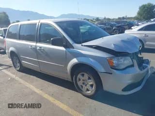 ✅ 2012 Dodge Grand Caravan SE • VIN: 2C4RDGBG7CR115283 • Lot: 42830485. Listed on IAAI with 233,317 mi. Free auction sales archive from the USA and detailed vehicle history report at DreamBid. Image 1.