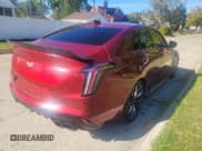 ✅ 2022 Cadillac CT4-V • VIN: 1G6D75RP5N0410099 • Lot: 76783534. Wystawiony na Copart z przebiegiem 14 298 mil. Bezpłatny archiwum sprzedaży aukcyjnych z USA i szczegółowy raport historii pojazdu na DreamBid. Zdjęcie 4.
