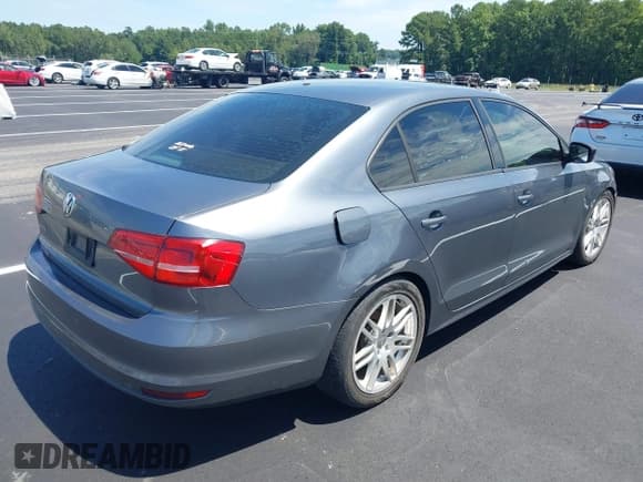 ✅ 2015 Volkswagen Jetta S • VIN: 3VW2K7AJ4FM306835 • Lot: 42881655. Listed on IAAI with 212,508 mi. Free auction sales archive from the USA and detailed vehicle history report at DreamBid. Image 4.
