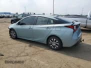 ✅ 2021 Toyota Prius XLE • VIN: JTDL9MFU8M3027326 • Лот: 67459325. Опубликован ранее на Copart с пробегом 158 137 миль. Бесплатный доступ к архиву аукционных продаж из США и подробный отчёт об истории автомобиля на DreamBid. Изображение 2.