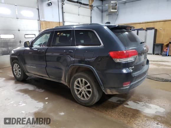 ✅ 2015 Jeep Grand Cherokee Laredo • VIN: 1C4RJFAG0FC142360 • Лот: 63558915. Опубликован ранее на Copart с пробегом 129 294 миль. Бесплатный доступ к архиву аукционных продаж из США и подробный отчёт об истории автомобиля на DreamBid. Изображение 2.