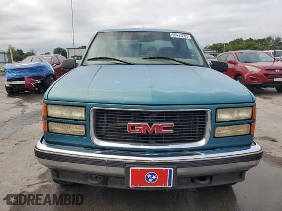 ✅ 1998 GMC Sierra 1500 • VIN: 2GTEK19R1W1526058 • Лот: 66497285. Опубликован ранее на Copart с пробегом 275 485 миль. Бесплатный доступ к архиву аукционных продаж из США и подробный отчёт об истории автомобиля на DreamBid. Изображение 5.