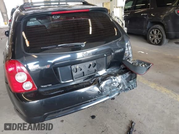 ✅ 2003 Mazda Protege • VIN: JM1BJ245431131390 • Лот: 42024381. Опубликован ранее на IAAI с пробегом 149 507 миль. Бесплатный доступ к архиву аукционных продаж из США и подробный отчёт об истории автомобиля на DreamBid. Изображение 6.