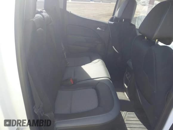 ✅ 2018 Chevrolet Colorado 2WD Z71 • VIN: 1GCGSDEN6J1173358 • Лот: 41620340. Опубликован ранее на IAAI с пробегом 93 185 миль. Бесплатный доступ к архиву аукционных продаж из США и подробный отчёт об истории автомобиля на DreamBid. Изображение 8.