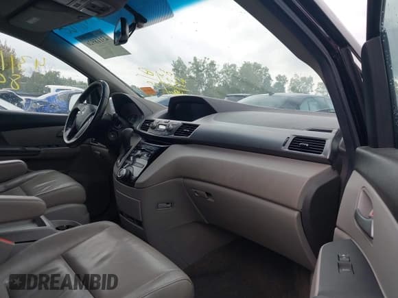 ✅ 2012 Honda Odyssey EX-L • VIN: 5FNRL5H69CB129560 • Лот: 43118926. Опубликован ранее на IAAI с пробегом 240 570 миль. Бесплатный доступ к архиву аукционных продаж из США и подробный отчёт об истории автомобиля на DreamBid. Изображение 5.