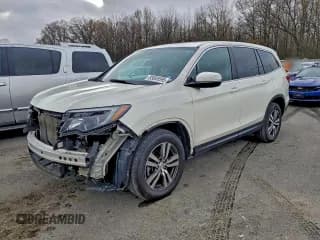 ✅ 2017 Honda Pilot EX-L • VIN: 5FNYF6H79HB039284 • Lot: 93885595. Listed on Copart with 103,949 mi. Free auction sales archive from the USA and detailed vehicle history report at DreamBid. Image 1.