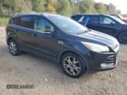 ✅ 2014 Ford Escape Titanium • VIN: 1FMCU0J96EUD19302 • Lot: 86528005. Listed on Copart with 198,303 mi. Free auction sales archive from the USA and detailed vehicle history report at DreamBid. Image 4.