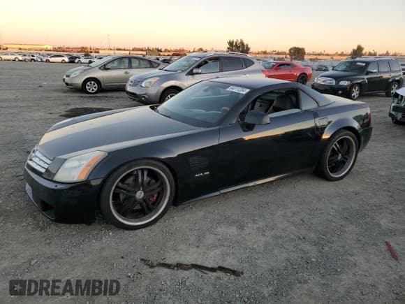 ✅ 2004 Cadillac XLR • VIN: 1G6YV34A445602565 • Лот: 84011204. Опубликован ранее на Copart с пробегом Не указан. Бесплатный доступ к архиву аукционных продаж из США и подробный отчёт об истории автомобиля на DreamBid. Изображение 1.
