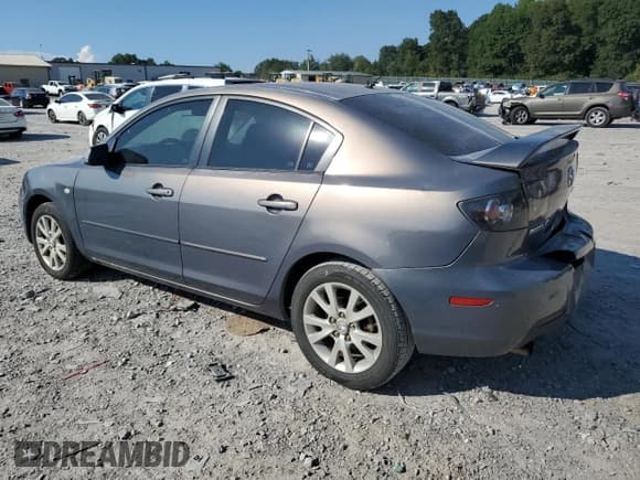 ✅ 2007 Mazda 3 i Touring • VIN: JM1BK32F471718077 • Лот: 69277595. Опубликован ранее на Copart с пробегом 256 154 миль. Бесплатный доступ к архиву аукционных продаж из США и подробный отчёт об истории автомобиля на DreamBid. Изображение 2.