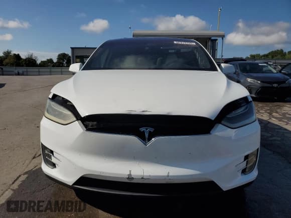 ✅ 2016 Tesla Model X 70D • VIN: 5YJXCBE21GF019275 • Lot: 66919705. Listed on Copart with 79,670 mi. Free auction sales archive from the USA and detailed vehicle history report at DreamBid. Image 5.