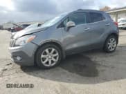 ✅ 2014 Buick Encore Leather • VIN: KL4CJCSB0EB565557 • Лот: 91891945. Опубликован ранее на Copart с пробегом 94 040 миль. Бесплатный доступ к архиву аукционных продаж из США и подробный отчёт об истории автомобиля на DreamBid. Изображение 1.