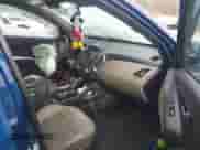 2014 Hyundai Tucson Limited with VIN KM8JUCAG1EU923895, listed as a IAAI auction lot 43296605 with 259,486 mi miles and . Bid and sale history available at DreamBid. Image 5.