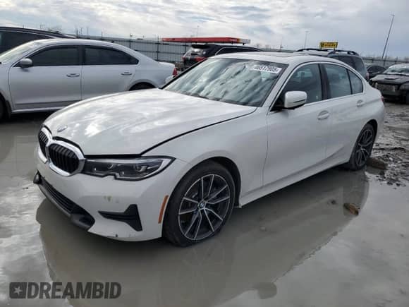 2020 BMW 3 Series 330i xDrive z VIN WBA5R7C02LFH40697, wystawiony jako Copart lot #46517905 z przebiegiem 74 076 mil mil oraz Szkoda całkowita • Salvage title. Historia ofert i sprzedaży dostępna na DreamBid. Obrazek 1.