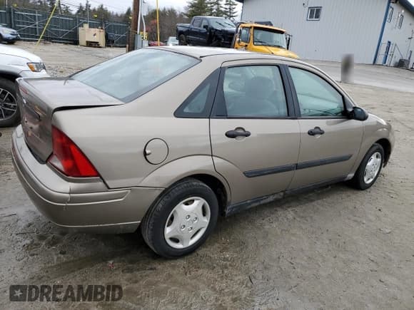 ✅ 2004 Ford Focus LX • VIN: 1FAFP33Z74W132828 • Lot: 45993904. Listed on Copart with 104,735 mi. Free auction sales archive from the USA and detailed vehicle history report at DreamBid. Image 3.