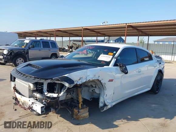 ✅ 2022 Dodge Charger Scat Pack Widebody • VIN: 2C3CDXGJ3NH105065 • Lot: 42954950. Wystawiony na IAAI z przebiegiem 18 236 mil. Bezpłatny archiwum sprzedaży aukcyjnych z USA i szczegółowy raport historii pojazdu na DreamBid. Zdjęcie 23.