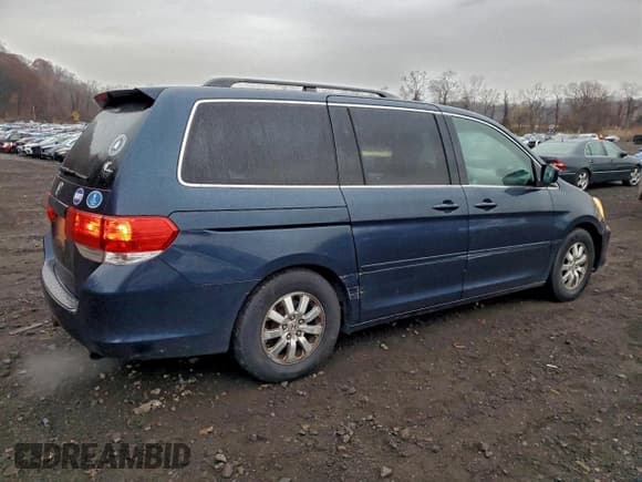 ✅ 2010 Honda Odyssey EX • VIN: 5FNRL3H49AB057534 • Lot: 94401015. Listed on Copart with 149,571 mi. Free auction sales archive from the USA and detailed vehicle history report at DreamBid. Image 3.