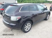 ✅ 2009 Mazda CX-7 Grand Touring • VIN: JM3ER293390226364 • Лот: 42360844. Опубликован ранее на IAAI с пробегом 136 399 миль. Бесплатный доступ к архиву аукционных продаж из США и подробный отчёт об истории автомобиля на DreamBid. Изображение 4.
