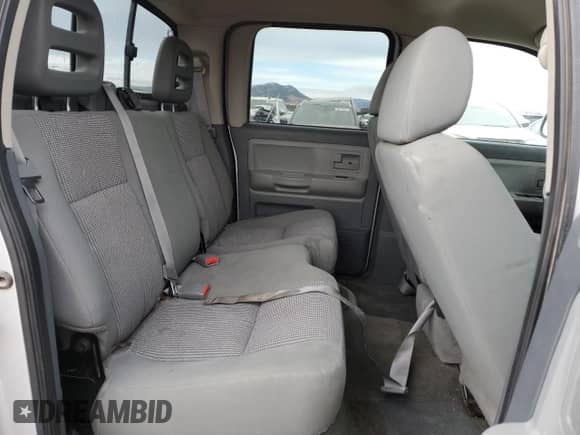 2007 Dodge Dakota SLT z VIN 1D7HW48K27S147617, wystawiony jako Copart lot #74064254 z przebiegiem 150 069 mil mil oraz Czysty tytuł • Clean title. Historia ofert i sprzedaży dostępna na DreamBid. Obrazek 10.