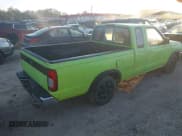 ✅ 1998 Nissan Frontier XE • VIN: 1N6DD26S7WC362048 • Lot: 43379935. Listed on IAAI with 142,721 mi. Free auction sales archive from the USA and detailed vehicle history report at DreamBid. Image 4.