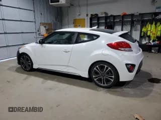 ✅ 2016 Hyundai Veloster Turbo • VIN: KMHTC6AE3GU250686 • Lot: 83077234. Wystawiony na Copart z przebiegiem 140 737 mil. Bezpłatny archiwum sprzedaży aukcyjnych z USA i szczegółowy raport historii pojazdu na DreamBid. Zdjęcie 2.