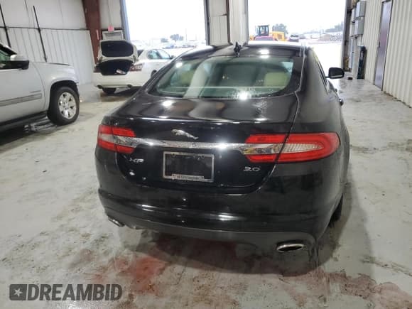 ✅ 2013 Jaguar XF RWD • VIN: SAJWA0E71D8S69937 • Лот: 71002474. Опубликован ранее на Copart с пробегом 111 919 миль. Бесплатный доступ к архиву аукционных продаж из США и подробный отчёт об истории автомобиля на DreamBid. Изображение 6.
