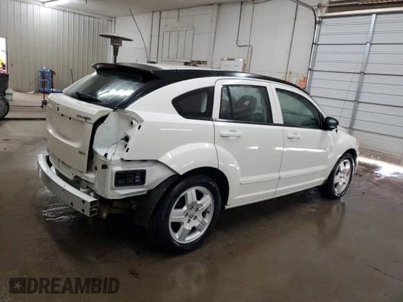 2009 Dodge Caliber SXT с VIN 1B3HB48A29D147770, выставлен на аукционе Copart как лот 77385114 с пробегом 81 938 миль миль и Списание • Salvage title. История ставок и продаж доступна на DreamBid. Изображение 3.