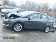 ✅ 2018 Ford Fiesta Titanium • VIN: 3FADP4CJ8JM117662 • Lot: 41199756. Listed on IAAI with 101,625 mi. Free auction sales archive from the USA and detailed vehicle history report at DreamBid. Image 15.