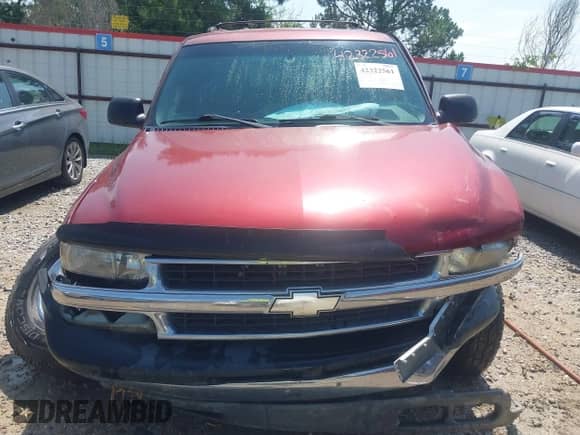 2001 Chevrolet Tahoe LT z VIN 1GNEK13T01R220304, wystawiony jako IAAI lot #42322561 z przebiegiem 139 197 mil mil oraz . Historia ofert i sprzedaży dostępna na DreamBid. Obrazek 13.