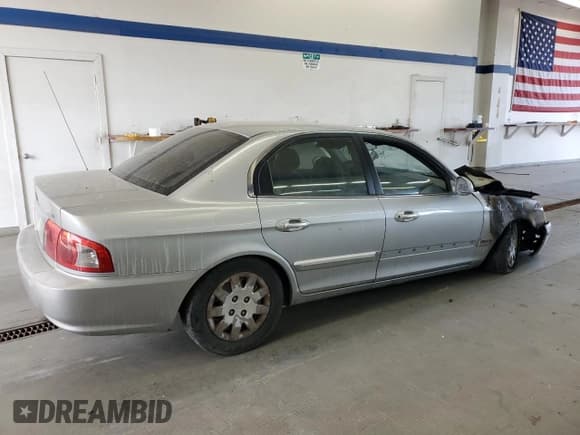 ✅ 2003 Kia Optima LX • VIN: KNAGD126335211255 • Лот: 60637665. Опубликован ранее на Copart с пробегом Не указан. Бесплатный доступ к архиву аукционных продаж из США и подробный отчёт об истории автомобиля на DreamBid. Изображение 3.
