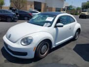 ✅ 2013 Volkswagen Beetle Fender Edition • VIN: 3VWJP7AT0DM619196 • Lot: 42451537. Listed on IAAI with 159,206 mi. Free auction sales archive from the USA and detailed vehicle history report at DreamBid. Image 2.